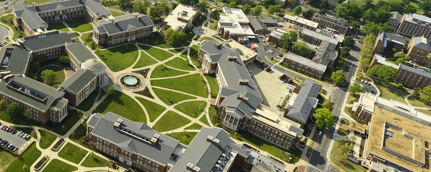 Background image of the UA campus from above.